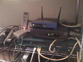 Messy home networking closet.jpg